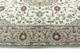 Corner detail of 2000s Kashan rug showing border pattern and Wool pile