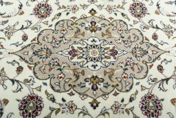 Central medallion detail of 2000s Kashan rug from Iran / Persia