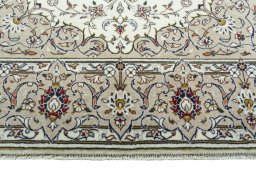 Full view of 2000s Kashan rug from Iran / Persia, 215 × 140 cm in Beige tones