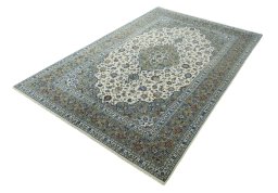 Corner detail of New Kashan rug showing border pattern and Cork pile