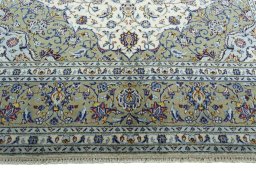 Full view of New Kashan rug from Iran / Persia, 307 × 203 cm in Beige tones