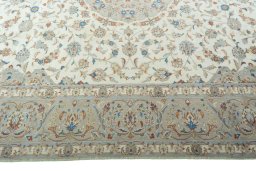 Corner detail of New Kashan rug showing border pattern and Wool pile