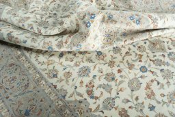 Surface texture of New Kashan rug with natural Wool and intricate pattern