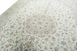 Backside of handmade New Kashan rug showing knot structure and weave density