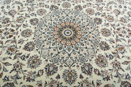 Central medallion detail of 2000s Kashan rug from Iran / Persia