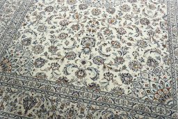Close-up detail of 2000s Kashan rug from Iran / Persia showing Wool weave