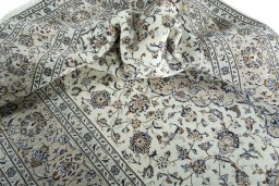 Close-up detail of 2000s Kashan rug from Iran / Persia showing Wool weave