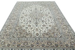 Close-up detail of 2000s Kashan rug from Iran / Persia showing Wool weave