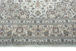 Close-up detail of 2000s Kashan rug from Iran / Persia showing Wool weave