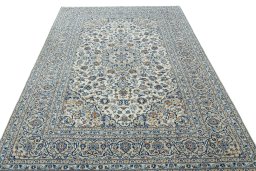 Surface texture of 2000s Kashan rug with natural Wool and intricate pattern