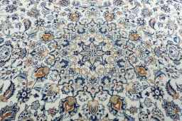 Central medallion detail of 2000s Kashan rug from Iran / Persia