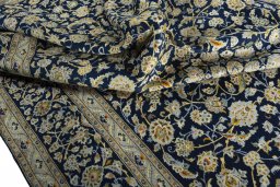 Surface texture of 1970s Kashan rug with natural Wool and intricate pattern