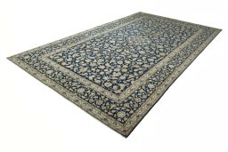 Corner detail of 1970s Kashan rug showing border pattern and Wool pile