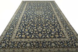 Surface texture of 1970s Kashan rug with natural Wool and intricate pattern