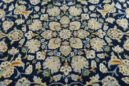 Central medallion detail of 1970s Kashan rug from Iran / Persia