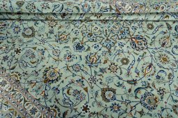 Close-up detail of 2000s Kashan rug from Iran / Persia showing Wool weave