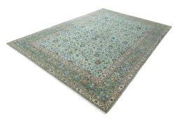 Corner detail of 2000s Kashan rug showing border pattern and Wool pile