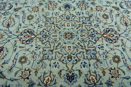 Central medallion detail of 2000s Kashan rug from Iran / Persia