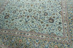 Close-up detail of 2000s Kashan rug from Iran / Persia showing Wool weave