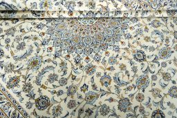 Close-up detail of 2000s Kashan rug from Iran / Persia showing Wool weave