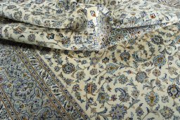 Surface texture of 2000s Kashan rug with natural Wool and intricate pattern