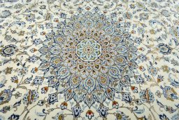 Central medallion detail of 2000s Kashan rug from Iran / Persia