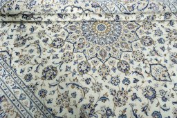 Close-up detail of 2000s Kashan rug from Iran / Persia showing Wool weave