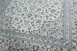 Close-up detail of 2000s Kashan rug from Iran / Persia showing Wool weave