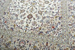 Close-up detail of 2000s Kashan rug from Iran / Persia showing Wool weave