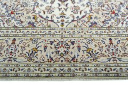 Full view of 2000s Kashan rug from Iran / Persia, 307 × 193 cm in Beige tones