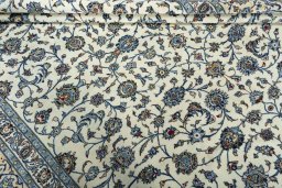 Close-up detail of 2000s Kashan rug from Iran / Persia showing Wool weave