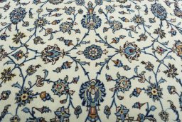 Central medallion detail of 2000s Kashan rug from Iran / Persia