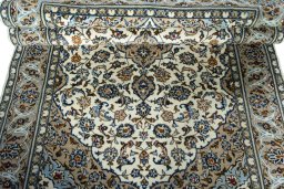 Close-up detail of 2000s Kashan rug from Iran / Persia showing Wool weave