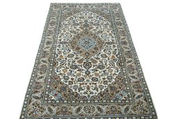 Surface texture of 2000s Kashan rug with natural Wool and intricate pattern