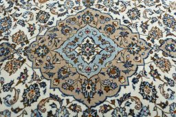 Central medallion detail of 2000s Kashan rug from Iran / Persia