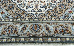 Full view of 2000s Kashan rug from Iran / Persia, 254 × 151 cm in Beige tones