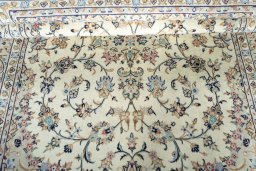 Close-up detail of 2000s Kashan rug from Iran / Persia showing Wool weave