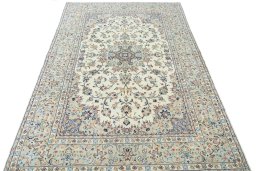 Surface texture of 2000s Kashan rug with natural Wool and intricate pattern