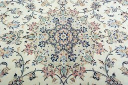 Central medallion detail of 2000s Kashan rug from Iran / Persia