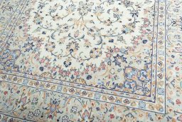 Close-up detail of 2000s Kashan rug from Iran / Persia showing Wool weave
