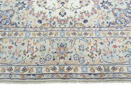Full view of 2000s Kashan rug from Iran / Persia, 302 × 197 cm in Beige tones