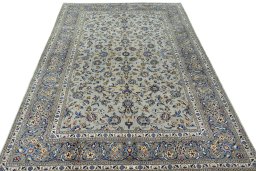 Surface texture of 2000s Kashan rug with natural Wool and intricate pattern