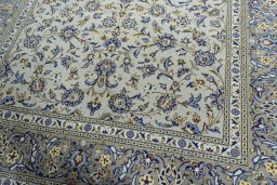 Close-up detail of 2000s Kashan rug from Iran / Persia showing Wool weave