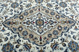 Central medallion detail of 2000s Kashan rug from Iran / Persia