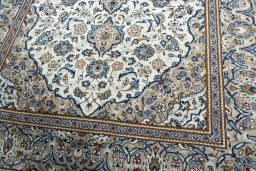 Close-up detail of 2000s Kashan rug from Iran / Persia showing Wool weave