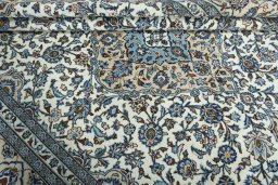 Close-up detail of 2000s Kashan rug from Iran / Persia showing Wool weave