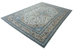 Corner detail of 2000s Kashan rug showing border pattern and Wool pile