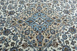 Central medallion detail of 2000s Kashan rug from Iran / Persia