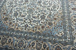 Close-up detail of 2000s Kashan rug from Iran / Persia showing Wool weave