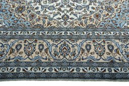 Full view of 2000s Kashan rug from Iran / Persia, 415 × 293 cm in Beige tones